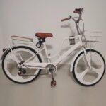 Vélo hybride femme 7 vitesses cadre bas acier, panier avant, porte-bagages